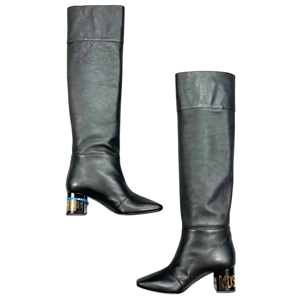 MOSCHINO pre-loved gold letter heel riding boots in black & gold - Picture 2 of 4